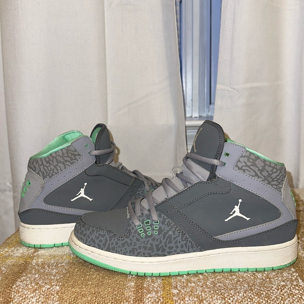 Great condition, authentic Nike Jordans, gray and teal green elephant print
